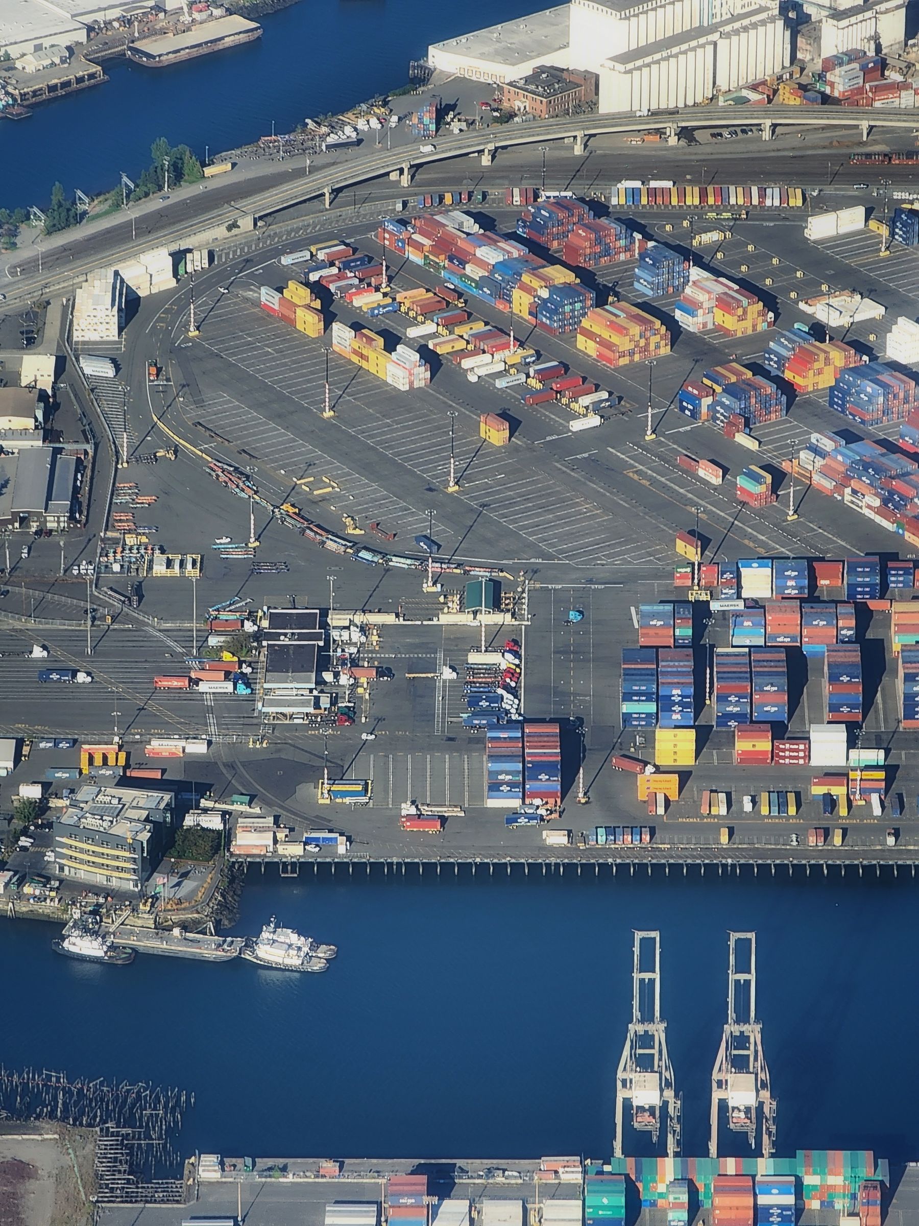 Aerial view of a port connecting ocean, road, rail, and warehouse logistics