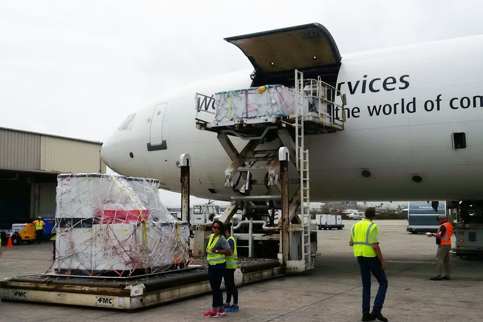 Cargo aircraft being loaded for a controlled international import route