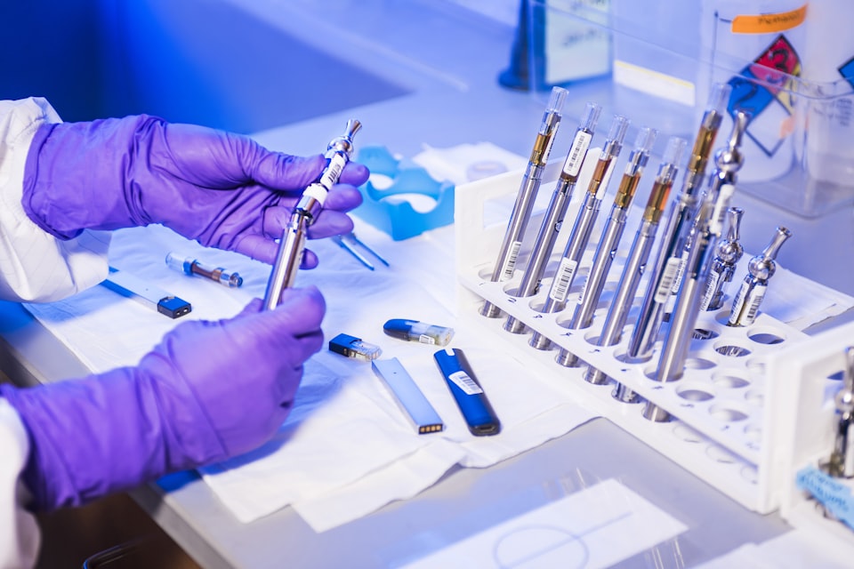 Quality professionals reviewing analytical tools and controlled records